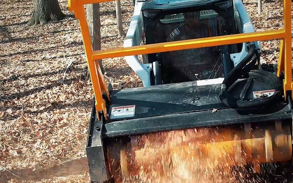 Goat Forestry equipment actively mulching woodland near Lafayette, Indiana
