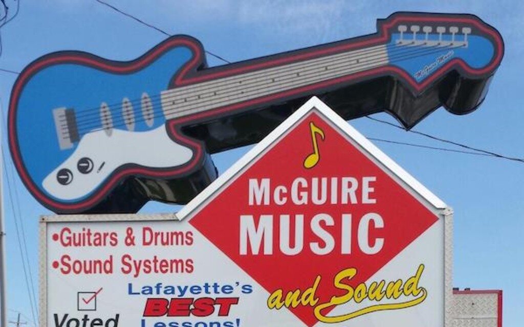 McGuire Music and Sound guitar-shaped sign in Lafayette, Indiana